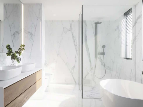 Bathroom remodel while marble floor and glass shower enclosure